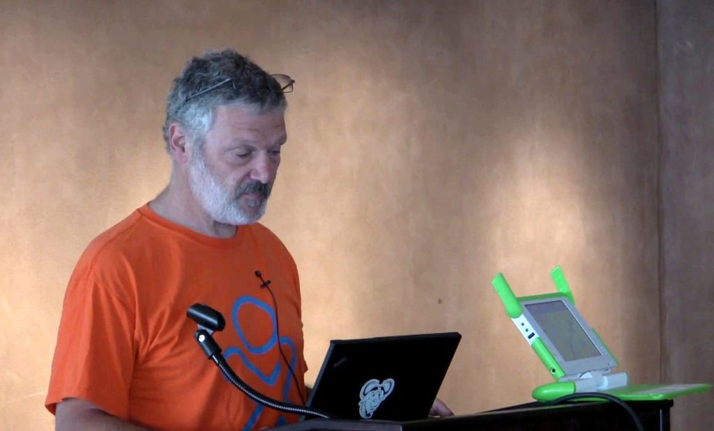 Photo of Walter Bender with the XO Laptop